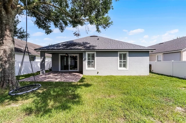 6539 Chagford Ln, Windermere, FL 34786 - back of property featuring stucco siding, a patio, ceiling fan, and roof with shingles