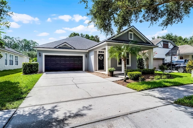 6539 Chagford Ln, Windermere, FL 34786 - view of front of house featuring an attached garage, a front lawn, driveway, and stucco siding