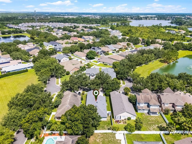 6539 Chagford Ln, Windermere, FL 34786 - aerial perspective of suburban area with a large body of water