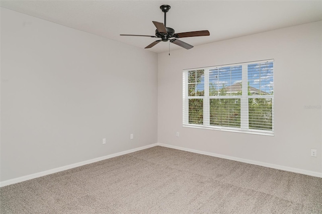 11307 Grand Park Ave, Riverview, FL 33578 - carpeted spare room featuring ceiling fan and baseboards