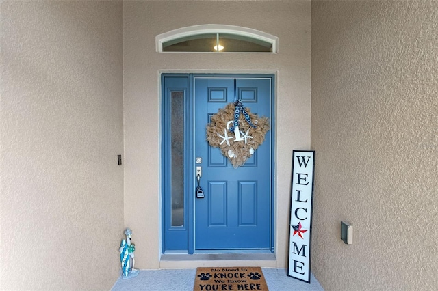 1005 Thunderhead Ln, Minneola, FL 34715 - property entrance featuring stucco siding
