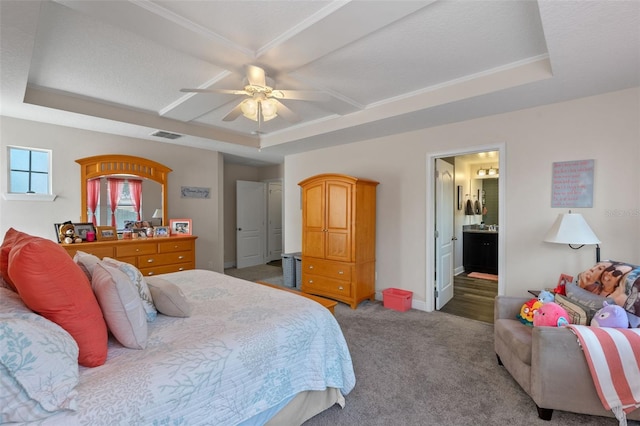 1005 Thunderhead Ln, Minneola, FL 34715 - carpeted bedroom featuring coffered ceiling, ensuite bath, and a ceiling fan