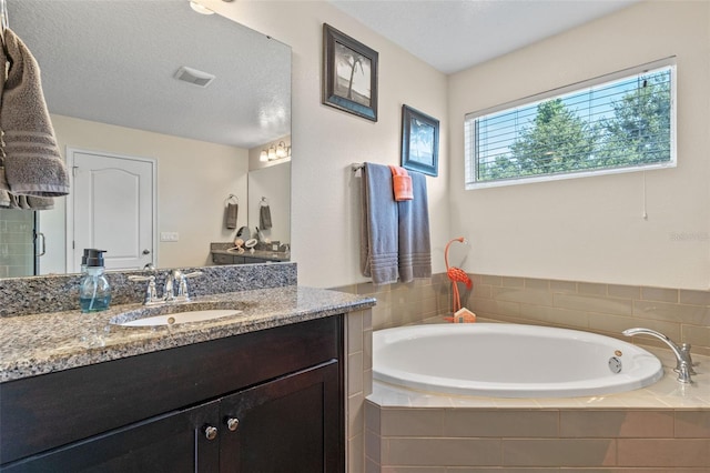1005 Thunderhead Ln, Minneola, FL 34715 - full bathroom featuring vanity and a garden tub