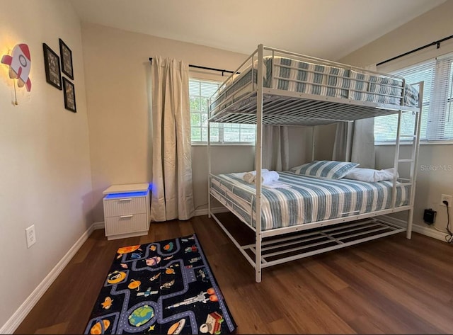 904 15th St NE, Winter Haven, FL 33881 - bedroom with wood finished floors and baseboards