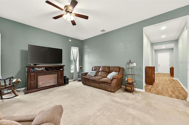 1559 Bayfront Park Aly, Winter Garden, FL 34787 - living room featuring a ceiling fan, carpet floors, attic access, and recessed lighting