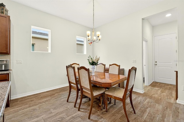 1559 Bayfront Park Aly, Winter Garden, FL 34787 - dining area with light wood-style flooring, a chandelier, plenty of natural light, and recessed lighting