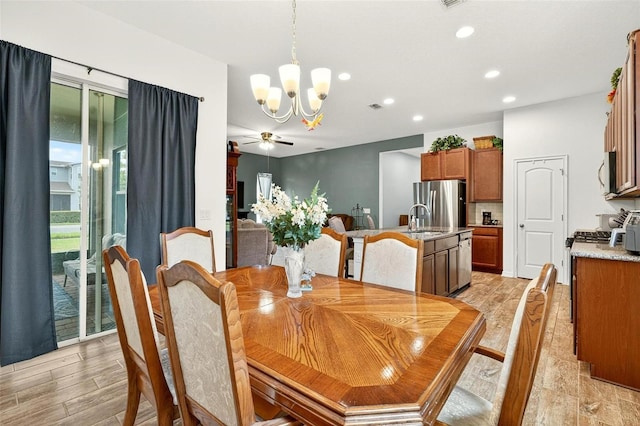 1559 Bayfront Park Aly, Winter Garden, FL 34787 - dining area featuring a chandelier, recessed lighting, light wood-style flooring, and ceiling fan