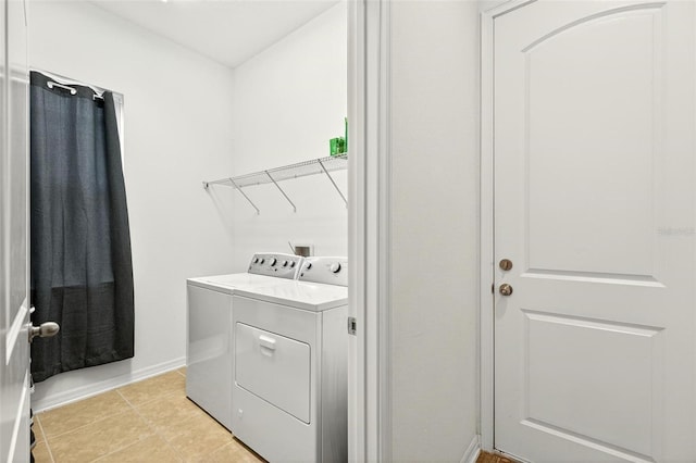 1559 Bayfront Park Aly, Winter Garden, FL 34787 - washroom with separate washer and dryer and light tile patterned floors