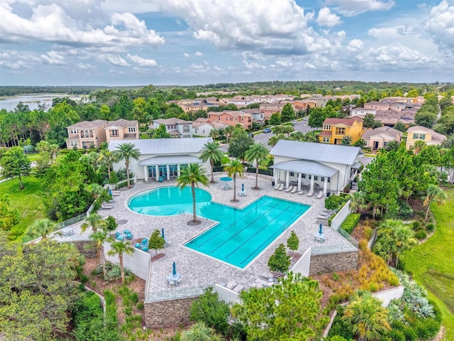 1559 Bayfront Park Aly, Winter Garden, FL 34787 - community pool featuring a patio area and a residential view