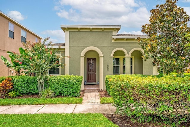 1559 Bayfront Park Aly, Winter Garden, FL 34787 - view of front of property with stucco siding
