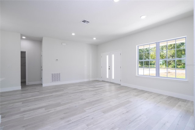 2011 W Tacoma Dr, Citrus Springs, FL 34434 - spare room featuring light wood finished floors and recessed lighting