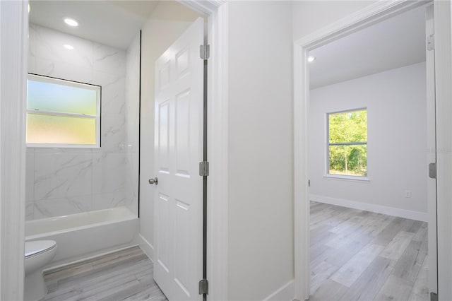 2011 W Tacoma Dr, Citrus Springs, FL 34434 - full bathroom featuring wood finished floors, shower / tub combination, and recessed lighting