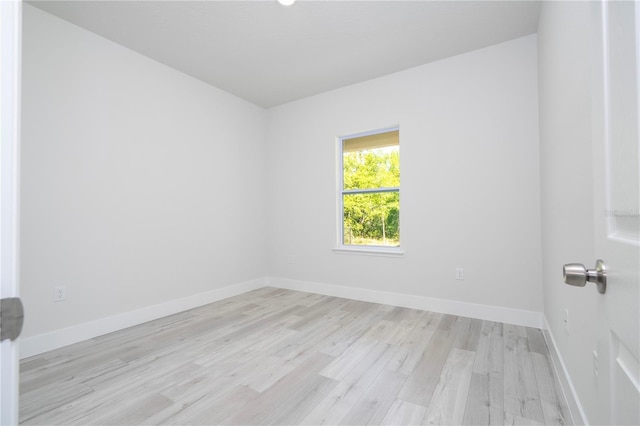 2011 W Tacoma Dr, Citrus Springs, FL 34434 - empty room with light wood-type flooring and baseboards