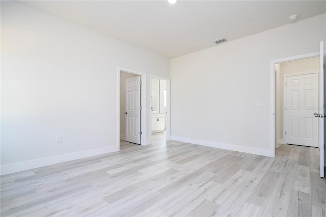 2011 W Tacoma Dr, Citrus Springs, FL 34434 - unfurnished room with light wood-type flooring and a smoke detector