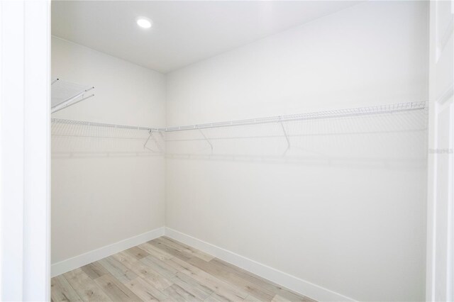 2011 W Tacoma Dr, Citrus Springs, FL 34434 - walk in closet featuring light wood-type flooring