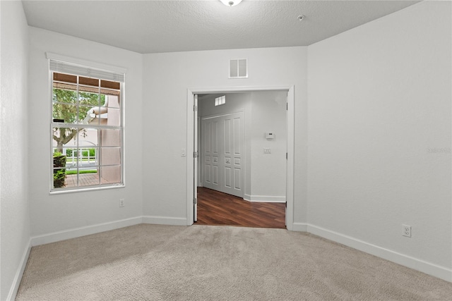 8362 Bella Tierra Ct Unit 10146, Davenport, FL 33896 - unfurnished bedroom featuring carpet floors and baseboards
