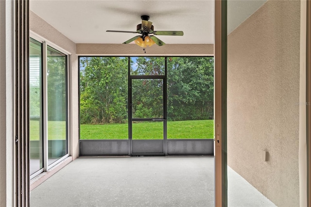 8362 Bella Tierra Ct Unit 10146, Davenport, FL 33896 - unfurnished sunroom featuring a ceiling fan