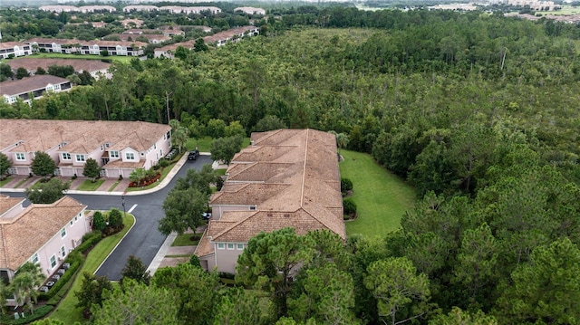 8362 Bella Tierra Ct Unit 10146, Davenport, FL 33896 - aerial view of residential area with a heavily wooded area