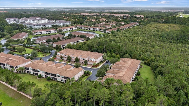 8362 Bella Tierra Ct Unit 10146, Davenport, FL 33896 - aerial view of property and surrounding area with a heavily wooded area