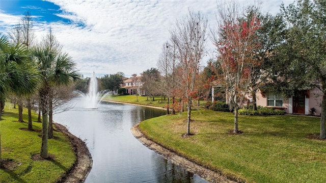 8362 Bella Tierra Ct Unit 10146, Davenport, FL 33896 - view of community with a water view, a yard, and dirt driveway