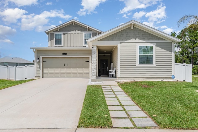 4828 Magnetite Loop, Mount Dora, FL 32757 - view of front of property featuring concrete driveway and a garage