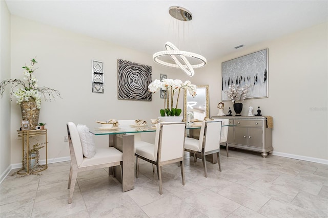 4828 Magnetite Loop, Mount Dora, FL 32757 - dining room featuring baseboards
