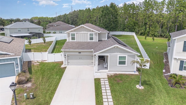 4828 Magnetite Loop, Mount Dora, FL 32757 - view of front facade featuring concrete driveway, an attached garage, a fenced backyard, a gate, and a residential view
