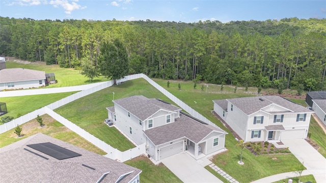 4828 Magnetite Loop, Mount Dora, FL 32757 - aerial view of residential area featuring a forest