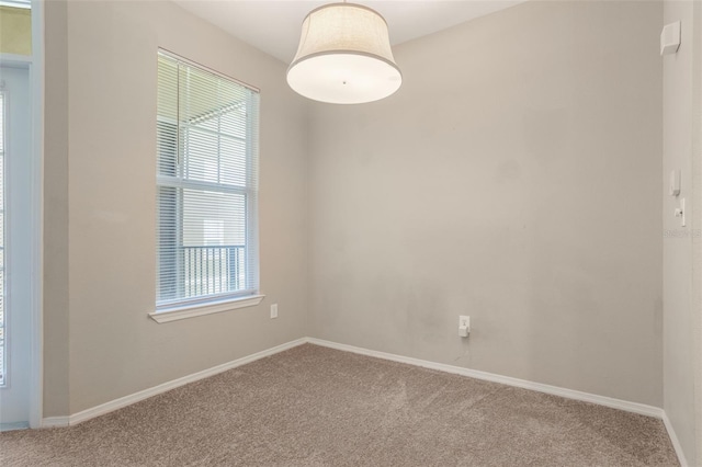408 Summit Ridge Pl Unit 210, Longwood, FL 32779 - spare room with carpet and healthy amount of natural light