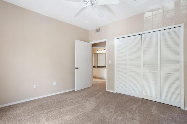 408 Summit Ridge Pl Unit 210, Longwood, FL 32779 - unfurnished bedroom with carpet floors, a closet, and ceiling fan