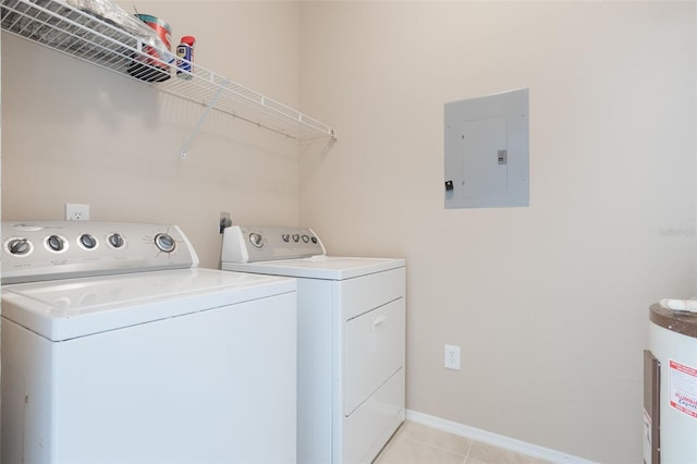 408 Summit Ridge Pl Unit 210, Longwood, FL 32779 - washroom with electric panel, washing machine and dryer, water heater, and light tile patterned floors
