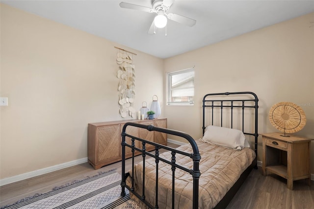 575 Ave M SE, Winter Haven, FL 33880 - bedroom with wood finished floors and ceiling fan