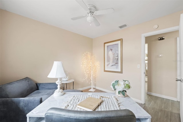 575 Ave M SE, Winter Haven, FL 33880 - office area with a ceiling fan and wood finished floors