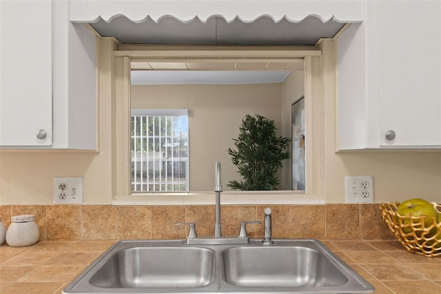 575 Ave M SE, Winter Haven, FL 33880 - kitchen view of white cabinetry and tile countertops