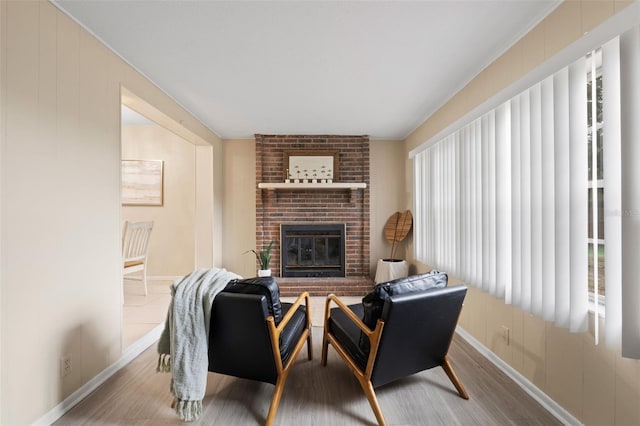 575 Ave M SE, Winter Haven, FL 33880 - living area featuring a fireplace and wood finished floors