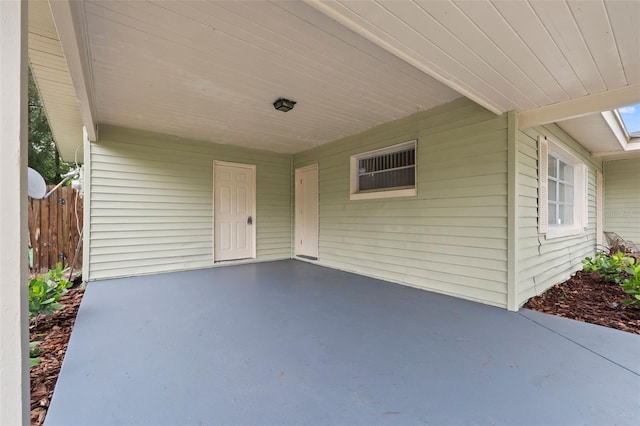 575 Ave M SE, Winter Haven, FL 33880 - view of patio featuring a carport