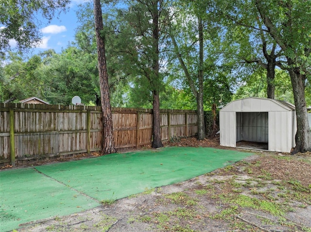 575 Ave M SE, Winter Haven, FL 33880 - fenced backyard featuring a shed