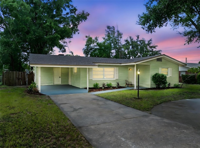 575 Ave M SE, Winter Haven, FL 33880 - ranch-style house featuring concrete driveway and an attached carport