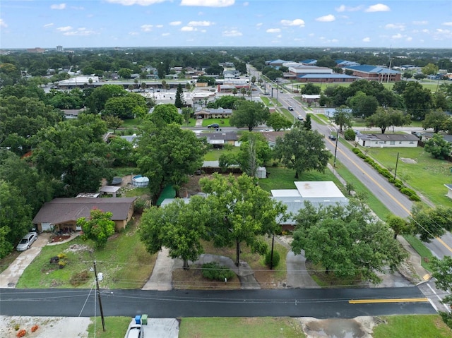 575 Ave M SE, Winter Haven, FL 33880 - aerial overview of property's location featuring a tree filled landscape