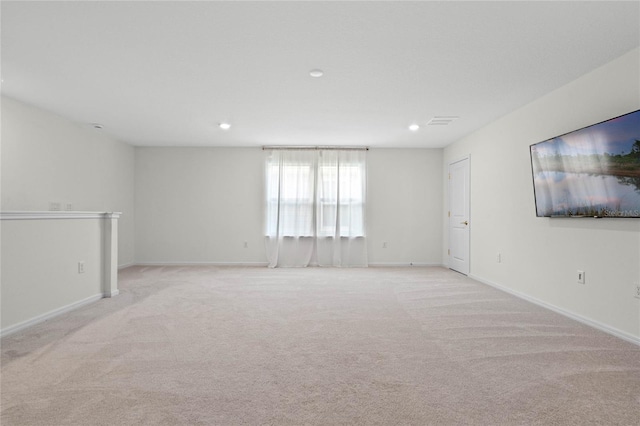 17571 Saw Palmeto Ave, Clermont, FL 34714 - spare room with light carpet and recessed lighting