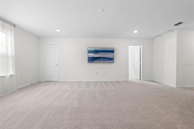 17571 Saw Palmeto Ave, Clermont, FL 34714 - spare room featuring recessed lighting and light colored carpet