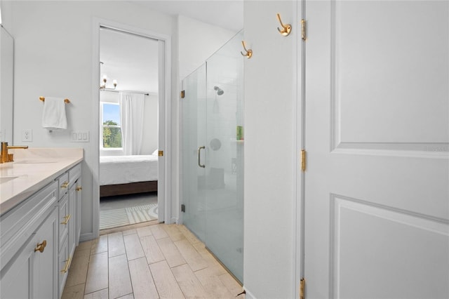 17571 Saw Palmeto Ave, Clermont, FL 34714 - ensuite bathroom featuring double vanity and a stall shower