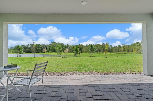 17571 Saw Palmeto Ave, Clermont, FL 34714 - view of patio / terrace with a water view and view of scattered trees