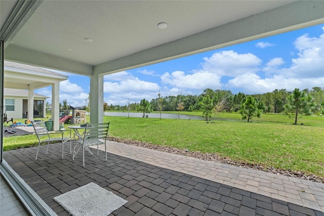 17571 Saw Palmeto Ave, Clermont, FL 34714 - view of patio / terrace featuring a water view