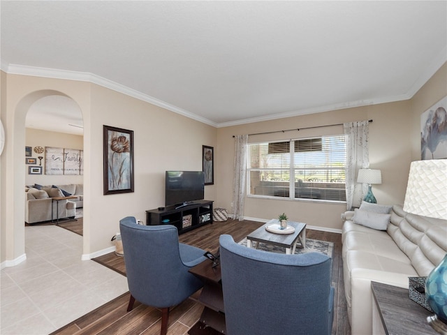2454 Black Lake Blvd, Winter Garden, FL 34787 - living room with arched walkways, ornamental molding, and light wood-type flooring