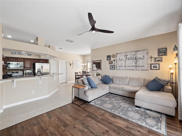 2454 Black Lake Blvd, Winter Garden, FL 34787 - living room with a ceiling fan, light wood finished floors, and recessed lighting