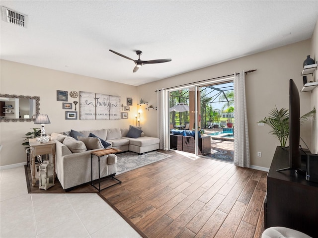 2454 Black Lake Blvd, Winter Garden, FL 34787 - living room with ceiling fan and wood finished floors