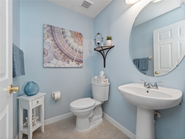 2454 Black Lake Blvd, Winter Garden, FL 34787 - half bath with toilet and tile patterned floors