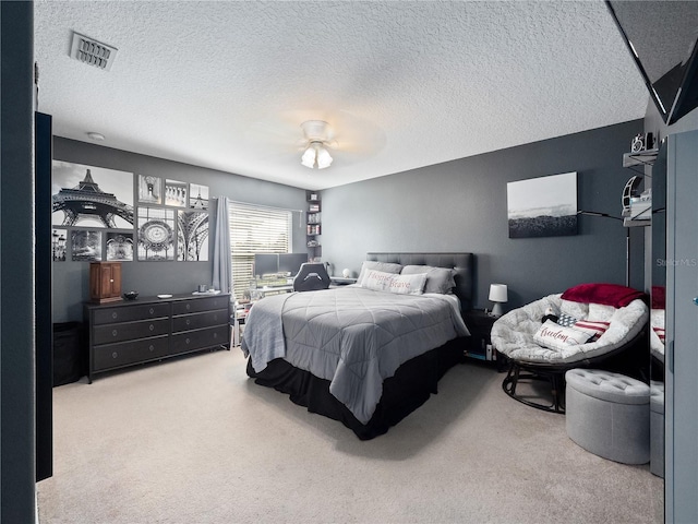 2454 Black Lake Blvd, Winter Garden, FL 34787 - carpeted bedroom with a textured ceiling and ceiling fan