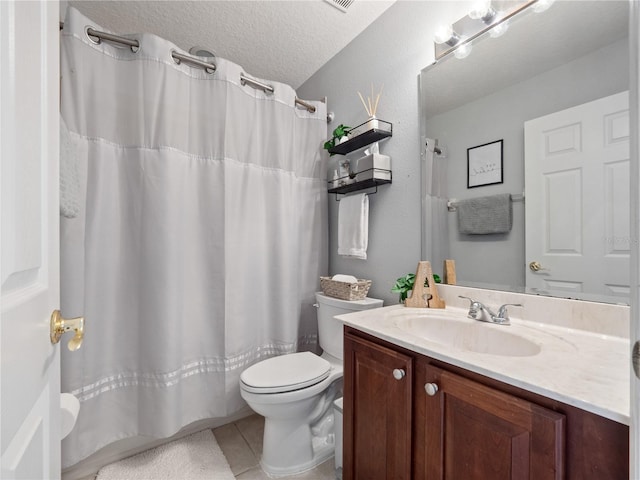 2454 Black Lake Blvd, Winter Garden, FL 34787 - bathroom with vanity, tile patterned flooring, a textured ceiling, and a shower with shower curtain